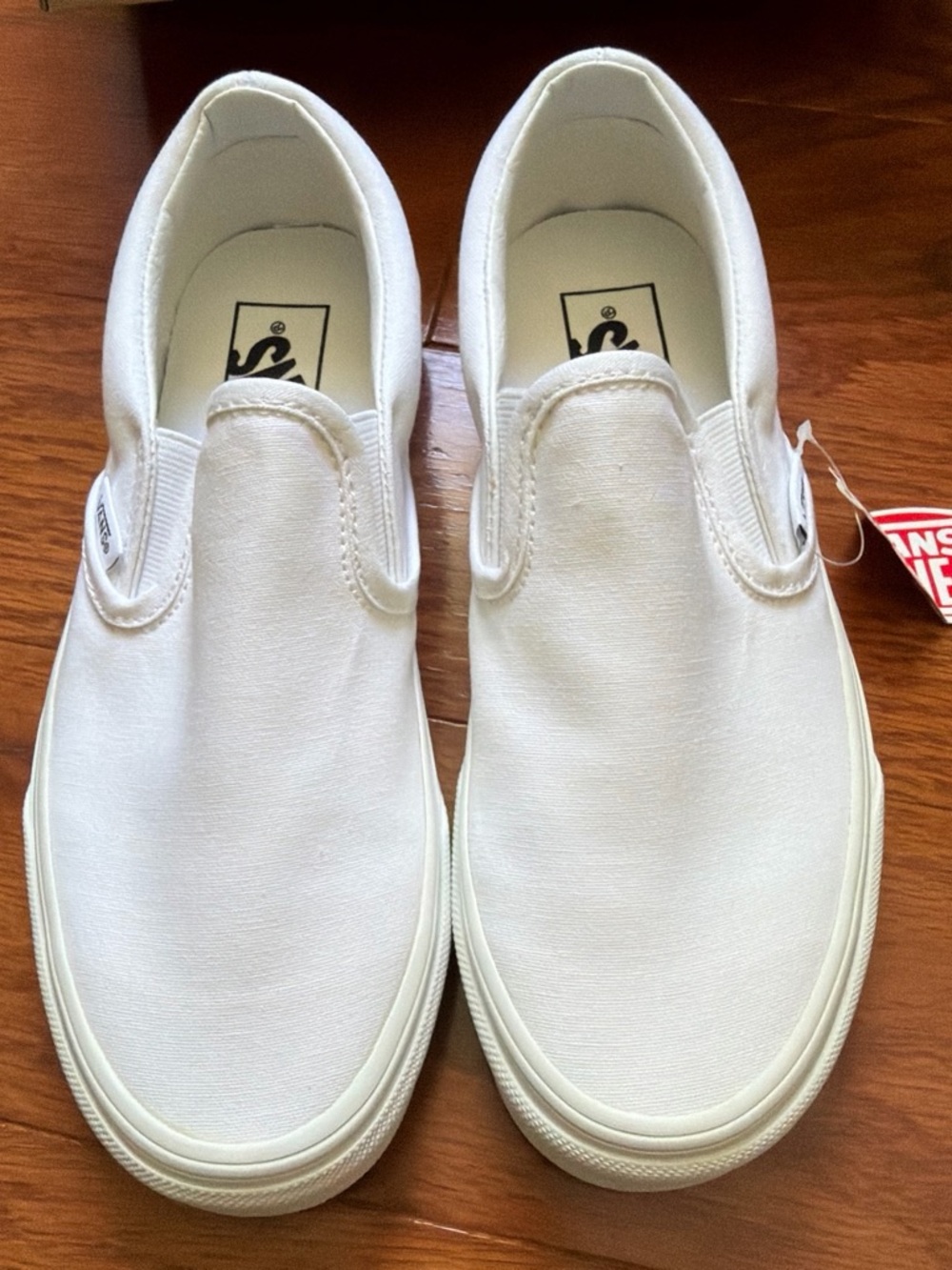 Vans White Slip-On Canvas Sneakers